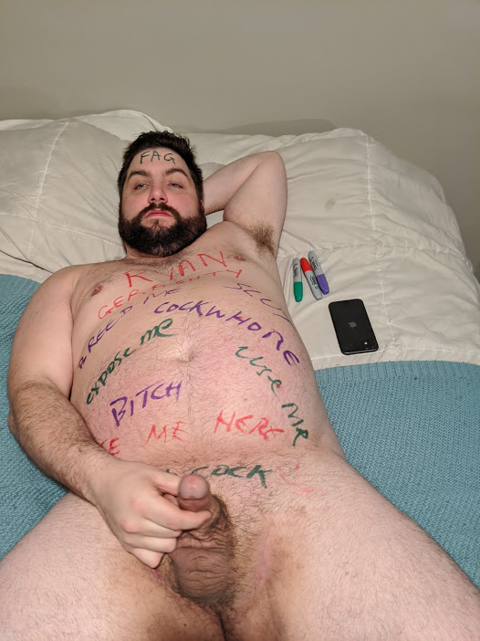 nude faggot with bodywriting
