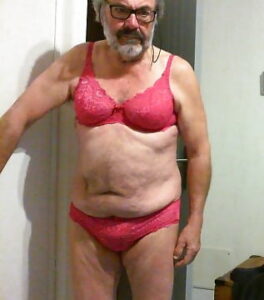 Sissy Noelle wearing pink bra and panty