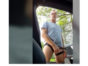 Pig Faggot wank near car before naked walk in woods