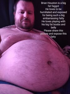 Brian Houston is a big fat faggot he loves playing with his big fat boobs and belly