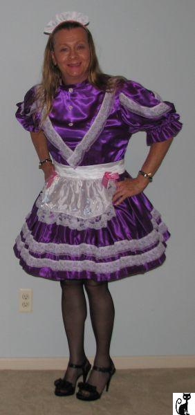 Chrisissy in her purple Sissy Maid Uniform ready to serve on kittyads dot com